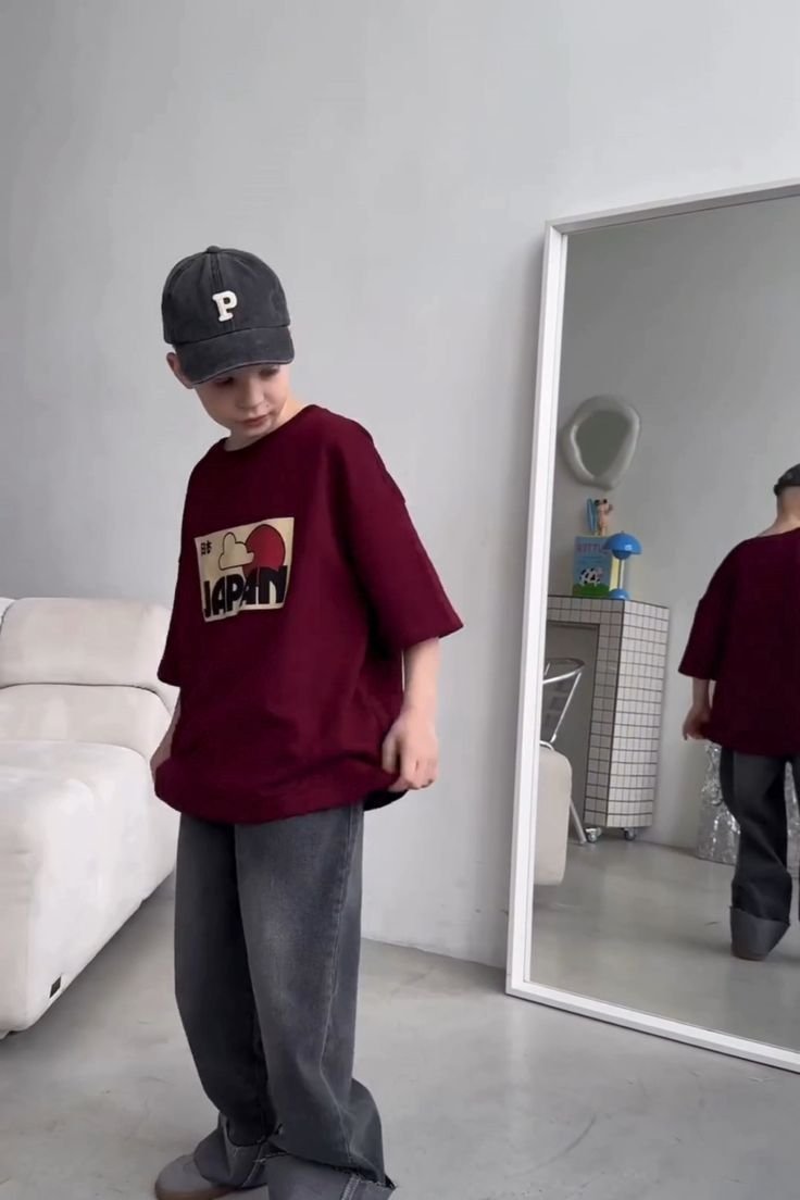 An oversized burgundy graphic T-shirt